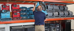 Water Damage Technician Prepping Air Movers